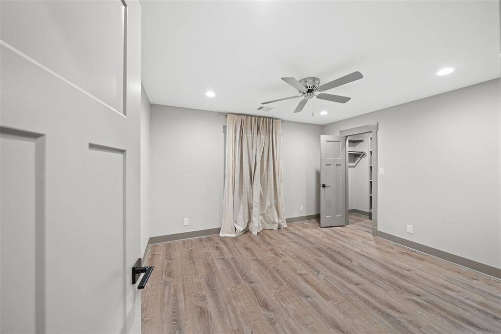 One of two secondary bedrooms complete with its own walk-in closet.