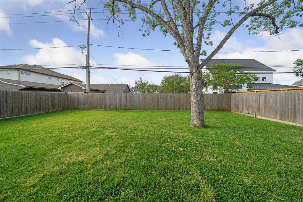 The huge backyard offers ample space for the littles to play, pets to roam, outdoor games, and entertaining guests