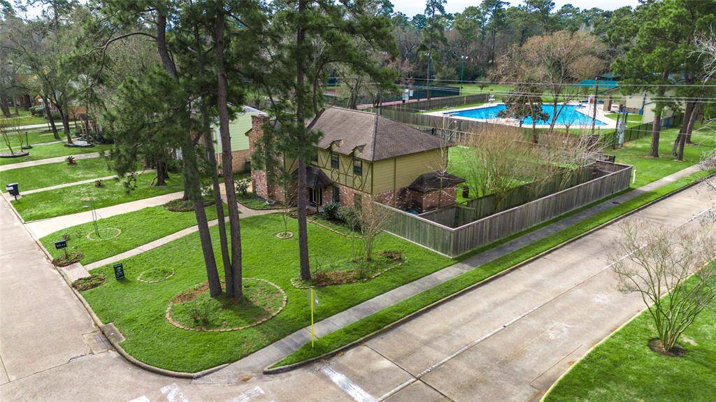 Beautiful premium lot backs right up to the community Rec Center features pools, parks, tennis courts, and much more!
