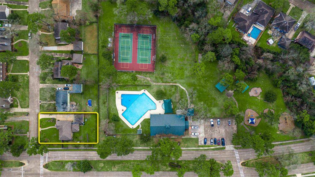 Aerial view of your premium corner lot just feet away from parks, pools, and recreational areas!