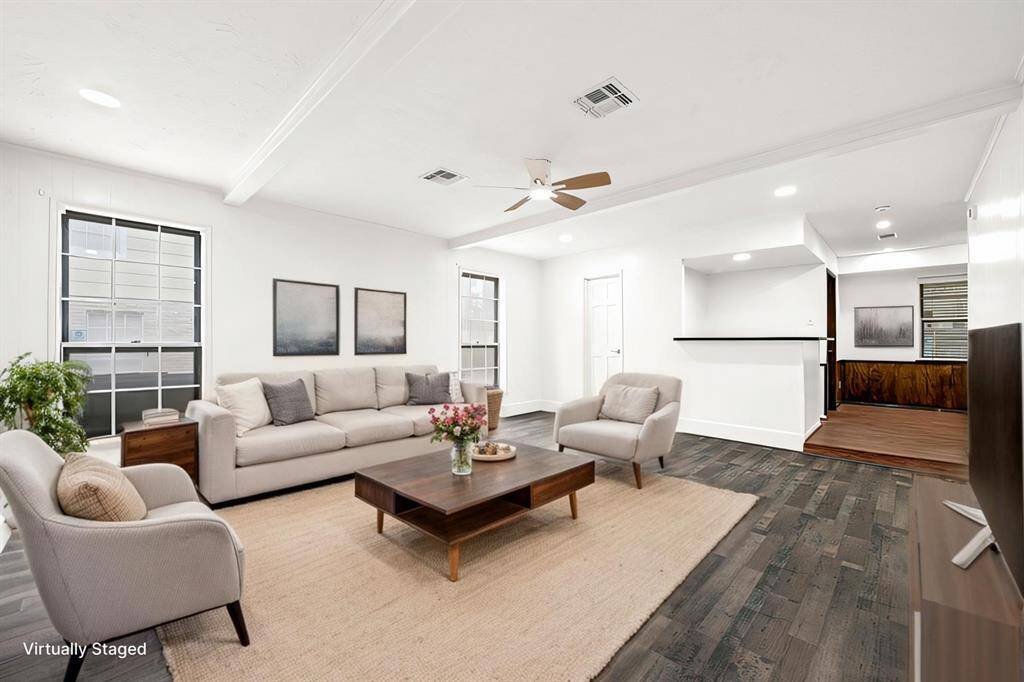 Virtually Staged: Formal living with a dry bar off the back and access to the formal dining room.