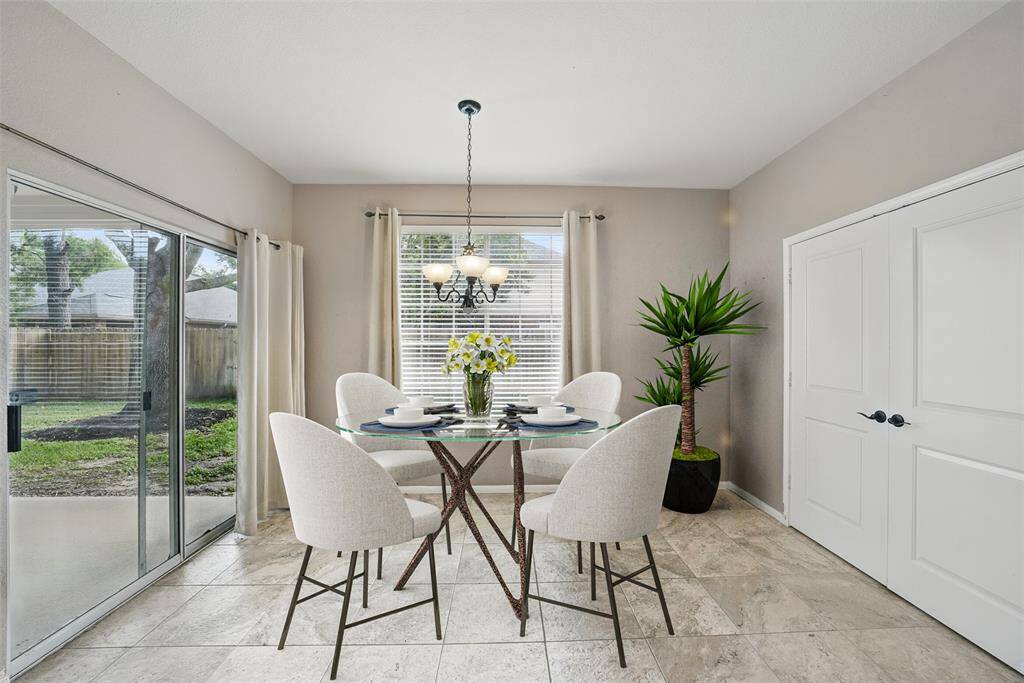 The breakfast area can accommodate a large table and has a nice view of the backyard.