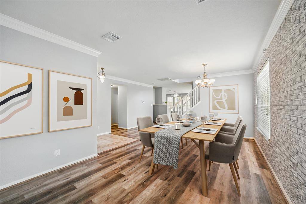 *virtually staged - The formal dining room and sitting area in the front of the home could be used in many different ways including a home office in the very front.