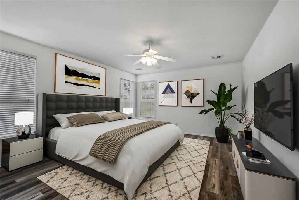 *virtually staged - The vinyl plank flooring continues throughout the primary bedroom.