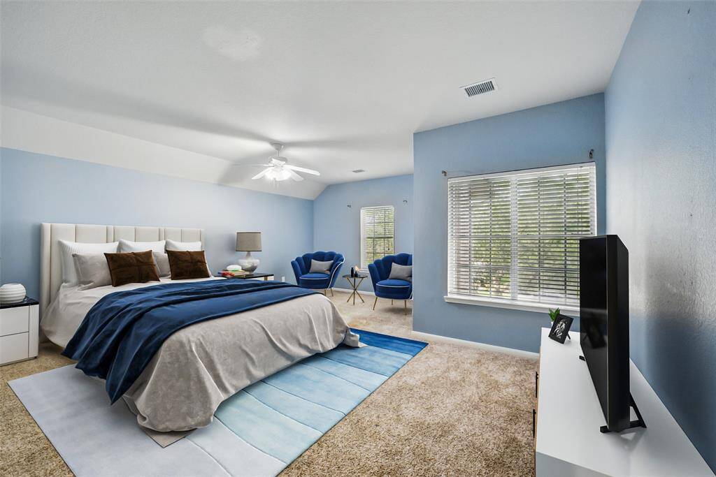 This oversized bedroom would make a great teen suite, guest room, playroom or even media room.