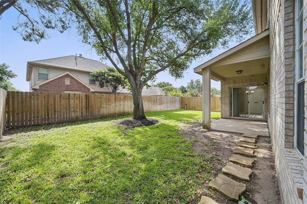 The back yard is a nice size and had the fence replaced in 2023.