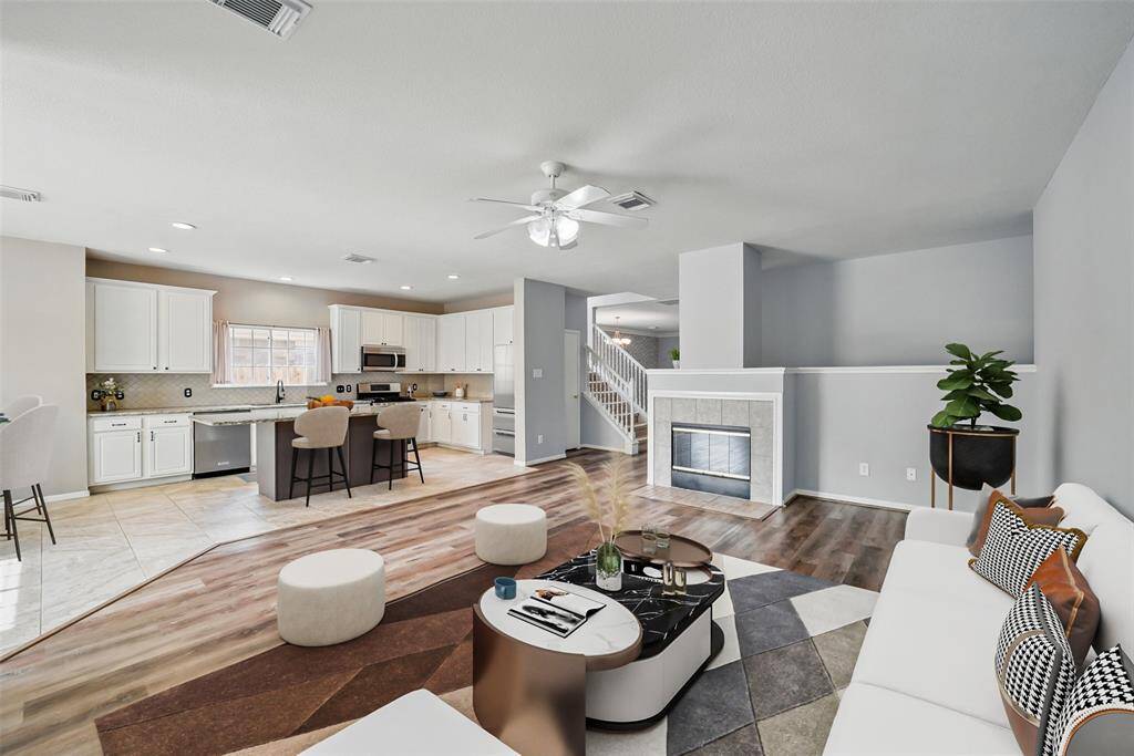 *virtually staged - Durable vinyl plank flooring in the foyer, family room and dining room.