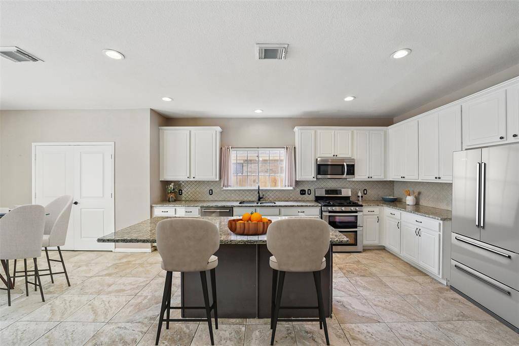 *virtually staged - The large island has room for lots of stools.