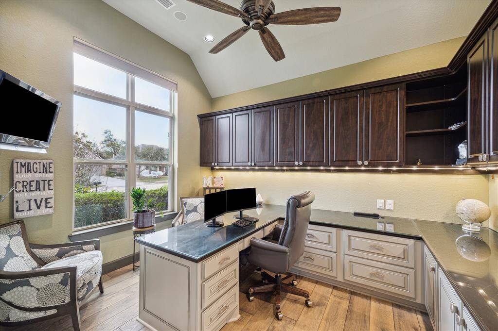 Heavy duty double front doors leading to the formal study.