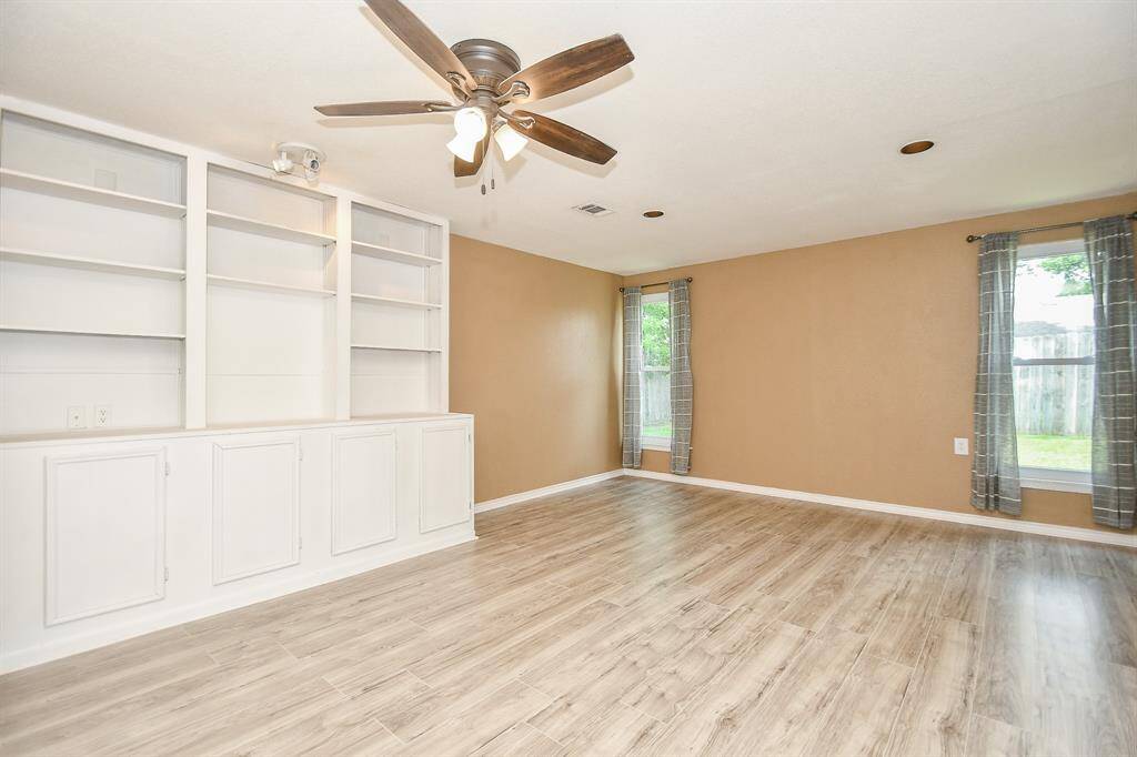Large Primary bedroom tucked away in the back of the home.