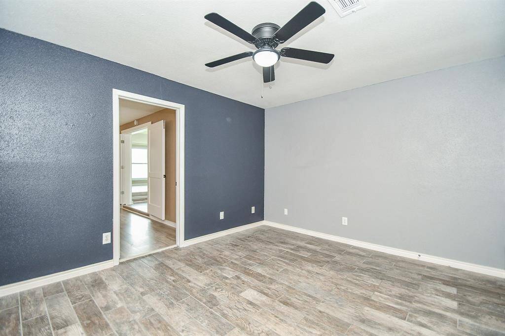 The door takes you into the addition of a larger The door takes you into the addition of a larger Primary Bedroom.