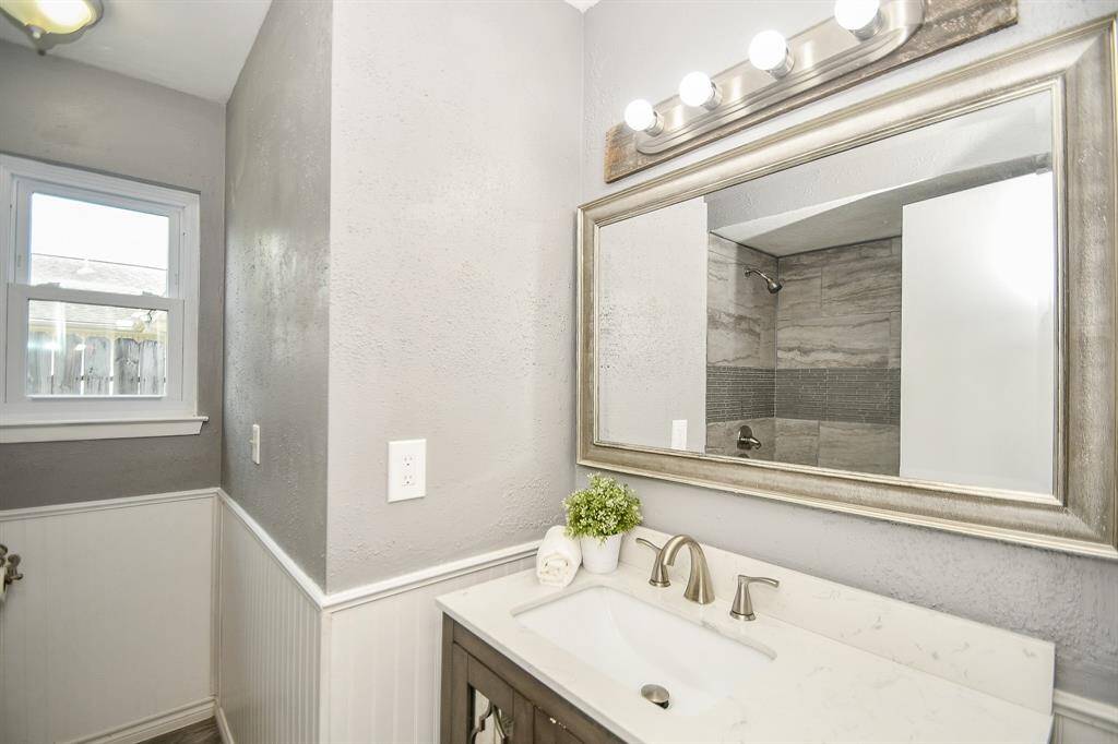 Bathroom with a jetty tub. Nice window in here, too.