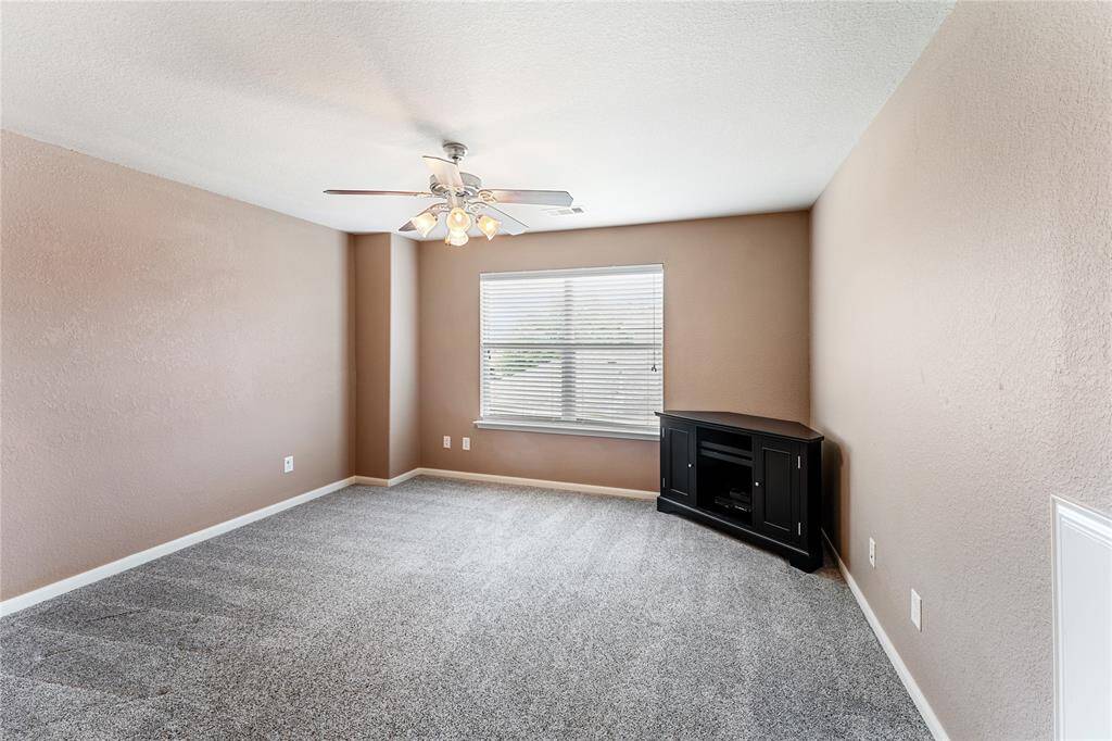 This is the first of three secondary bedrooms