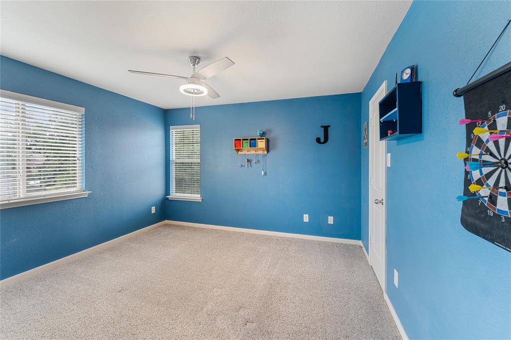 This colorful bedroom is sure to please a teen