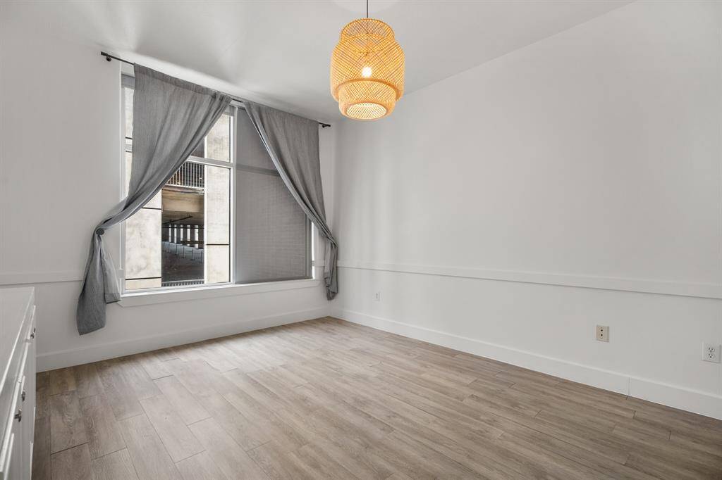 Primary bedroom with large window for lots of natural light.