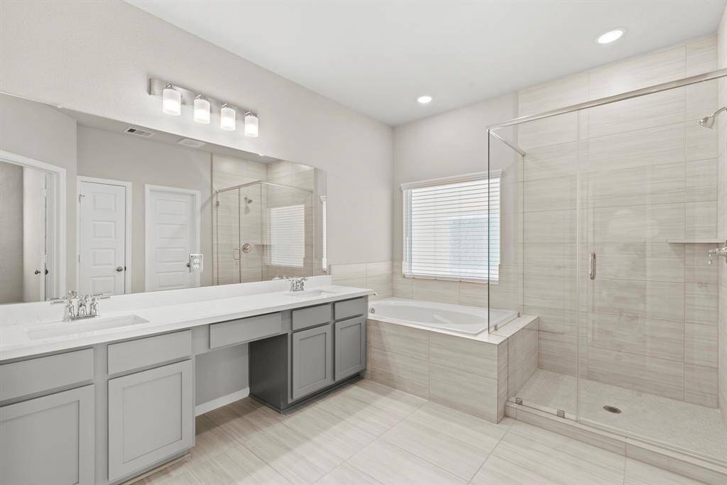 Photos depict a model home built on the same floor plan as the listed property. Variations may exist; visit in person for accurate details