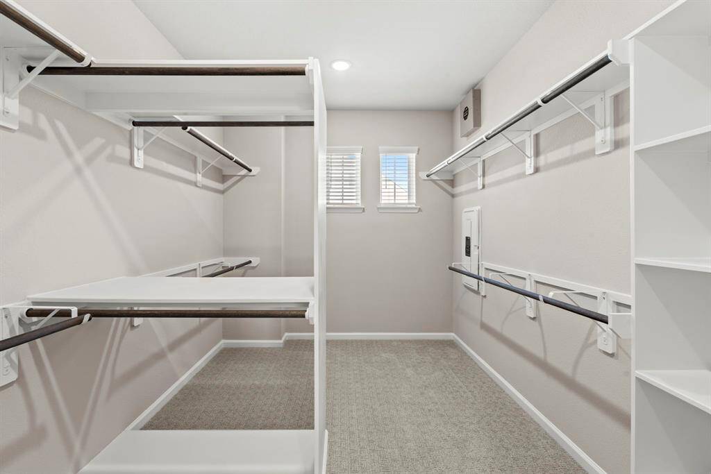 Photos depict a model home built on the same floor plan as the listed property. Variations may exist; visit in person for accurate details