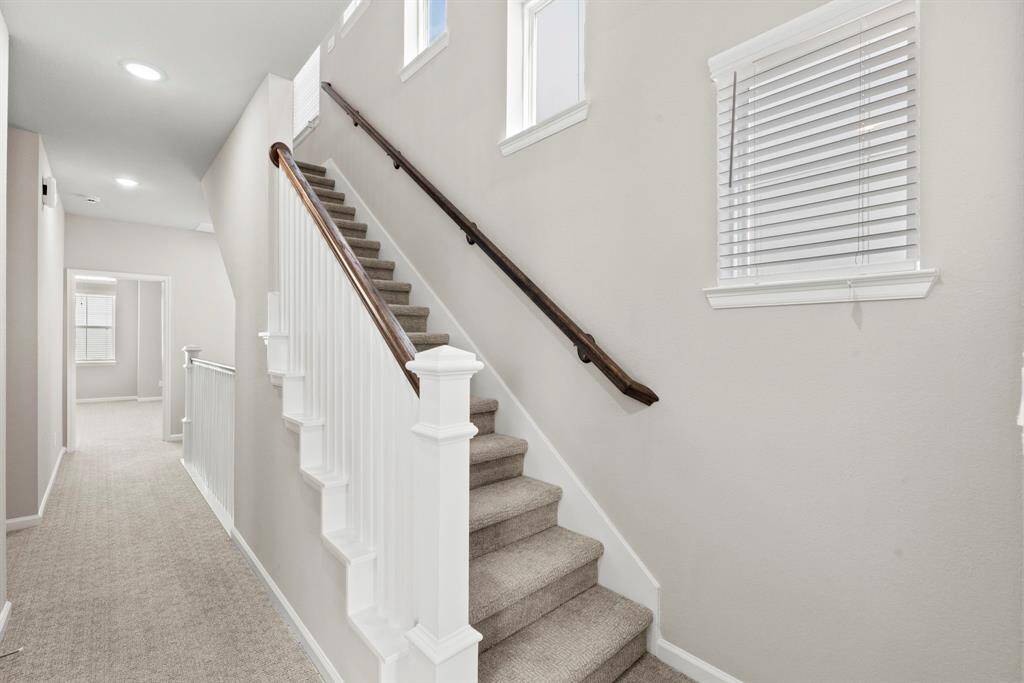Photos depict a model home built on the same floor plan as the listed property. Variations may exist; visit in person for accurate details