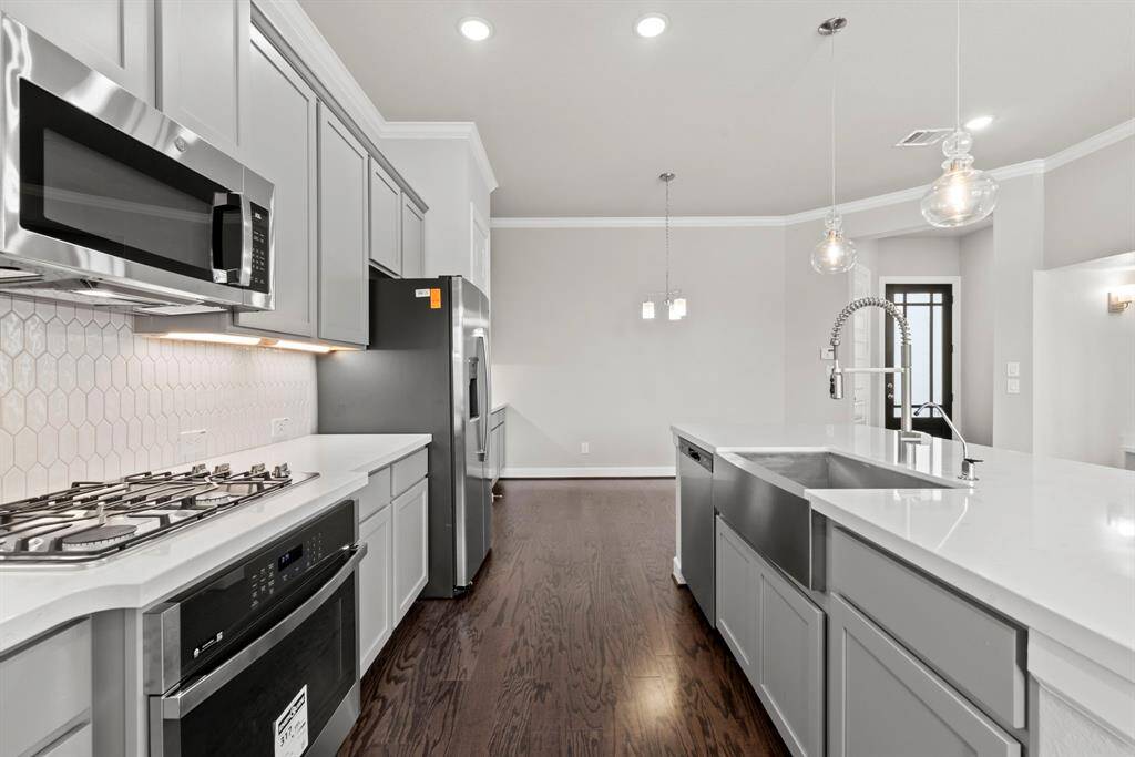 Photos depict a model home built on the same floor plan as the listed property. Variations may exist; visit in person for accurate details