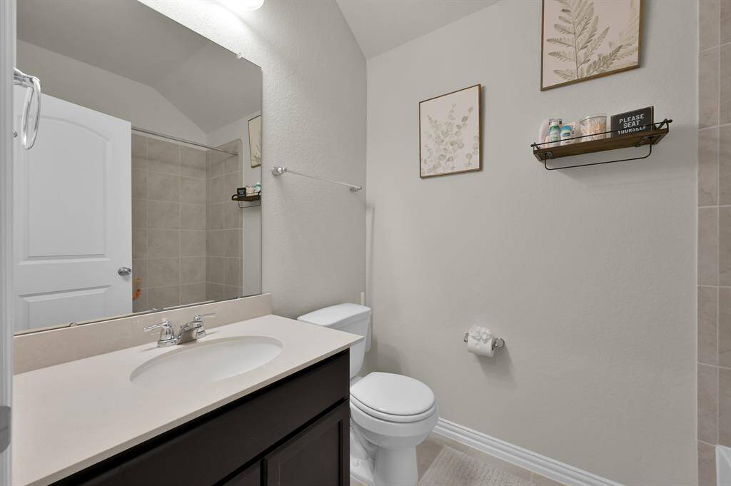 Second full bathroom with modern finishes and convenient layout.
