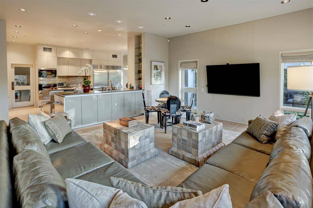 This functional space is ideal for daily living, offering a comfortable setting for family gatherings, casual meals, and cozy evenings.
