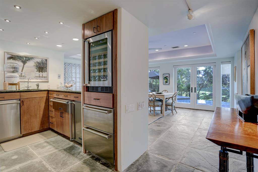 The lower level is an entertainer's dream, complete with a wet bar, game room, and a 3-car garage.