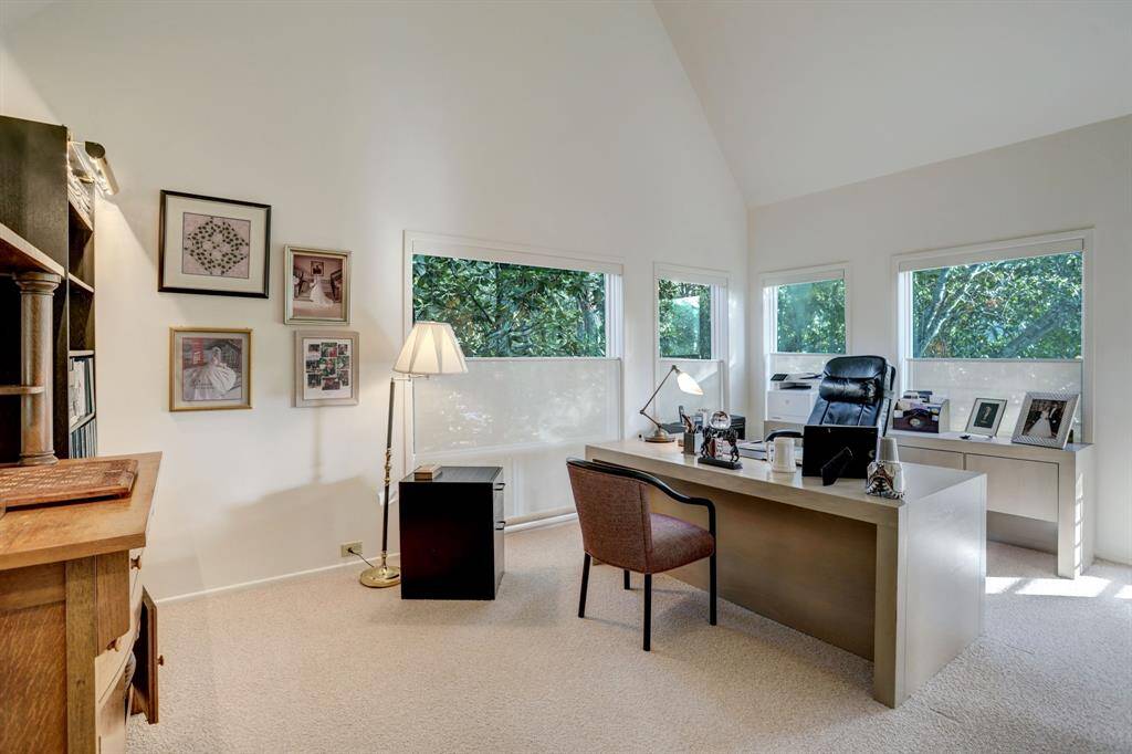 A secondary bedroom situated on the second floor boasting an en-suite bathroom.