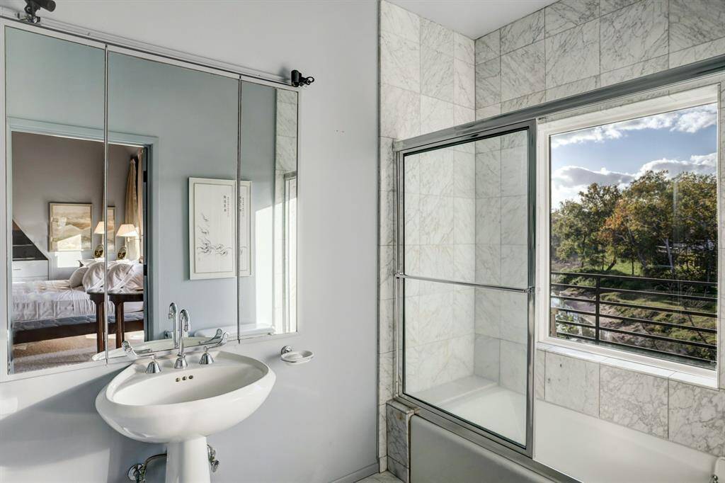 The en-suite secondary bedroom bathroom with incredible views.