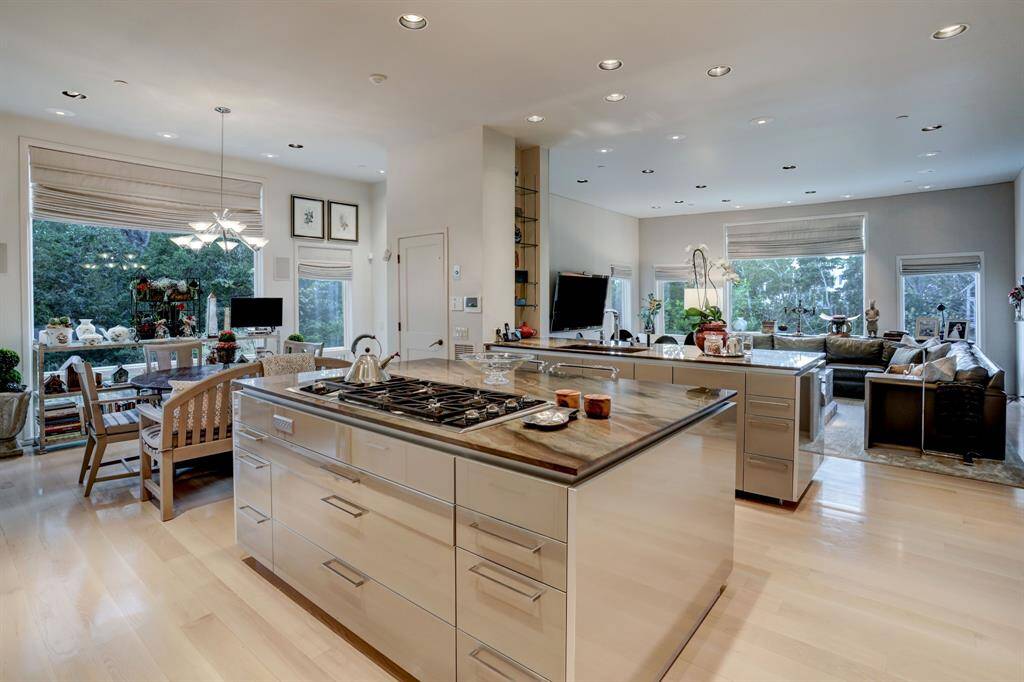 This kitchen is a culinary enthusiast's dream, featuring a sleek and modern design.
