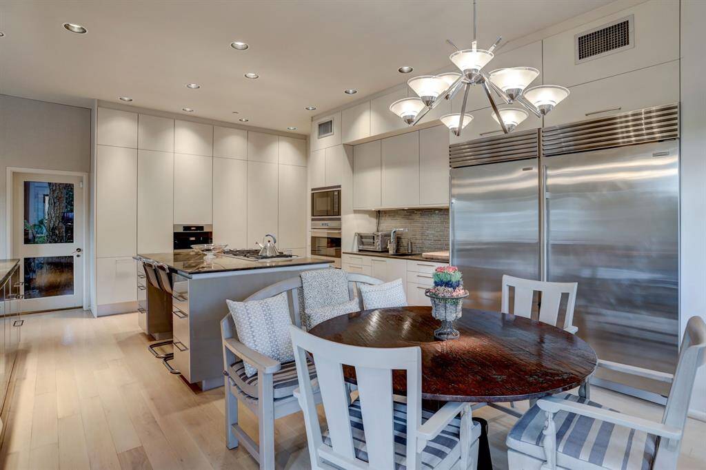 Adjacent to the kitchen is a cozy breakfast room ideal for casual dining.