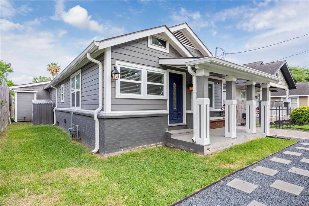 A picture-perfect front porch with craftsman-style columns, a freshly painted exterior, and modern updates welcomes you home. Enjoy peace of mind with an automatic gate, extended driveway, and fully fenced yard—all just minutes from the best of the Heights. Inside, discover a beautifully renovated interior that blends vintage charm with today’s lifestyle.