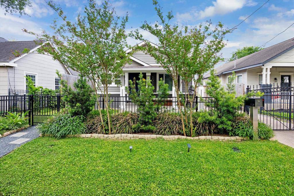 Charming curb appeal and timeless character welcome you home to this beautifully maintained Heights bungalow. Behind the black iron fence, lush landscaping and mature trees frame this 1920s gem. Don’t just admire it—schedule your private tour today and experience it for yourself!