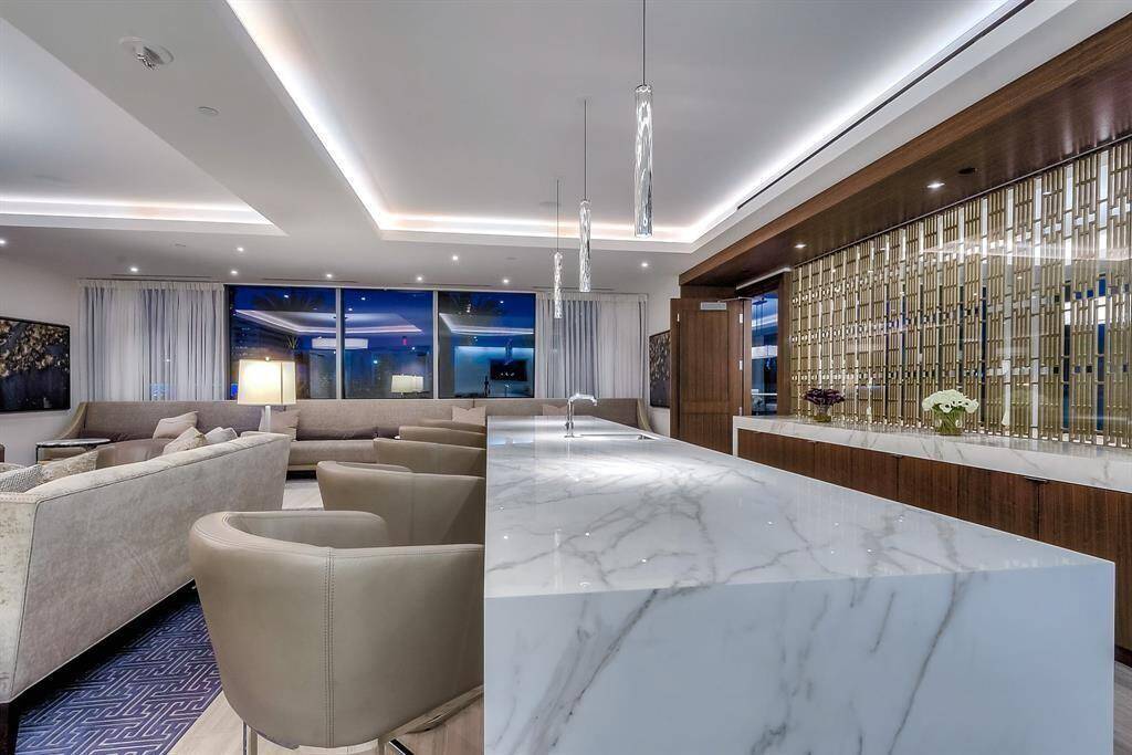 The 4th floor lounge is one of the guest lounges and party rooms, overlooking the pool area, that can be opened up for larger parties or closed for more intimate gatherings