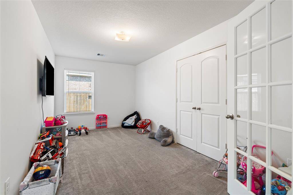 Perfect for working from home, this room offers quiet and comfort as an office or bedroom.