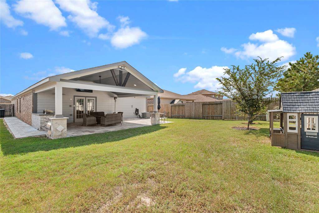 Private oasis with a covered patio and no back neighbors, providing the ultimate retreat.
