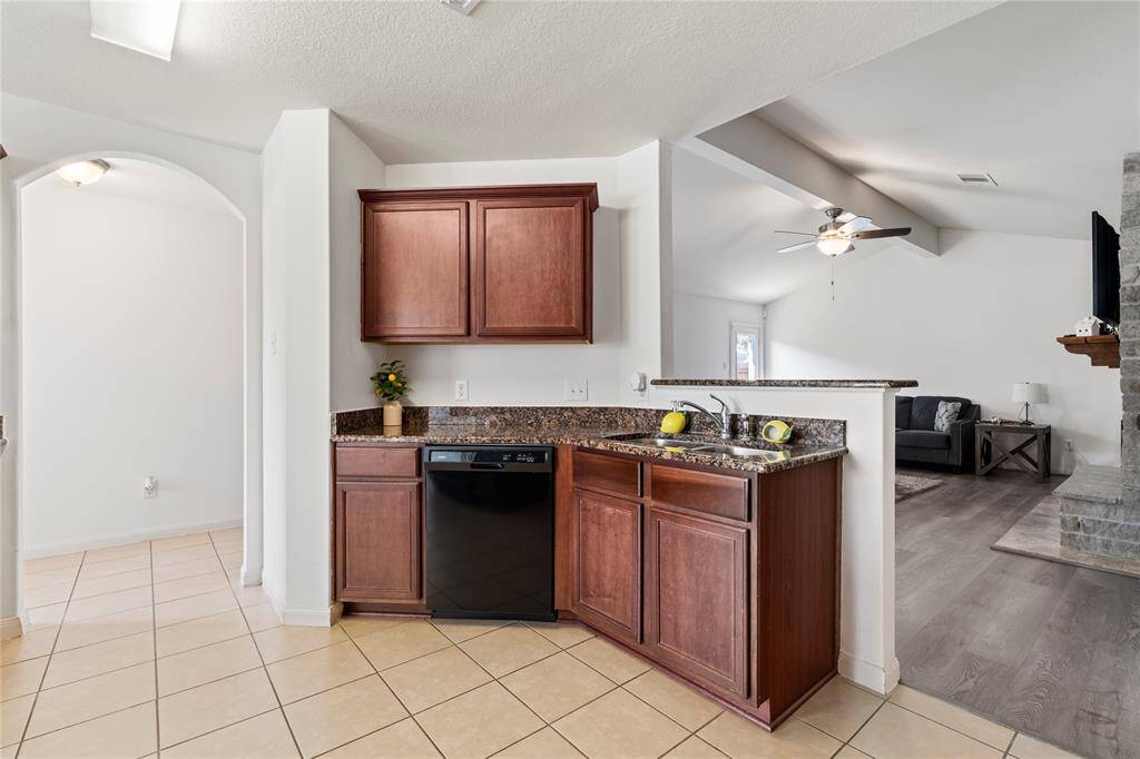 Functional kitchen design with granite countertops, perfect for the home chef.