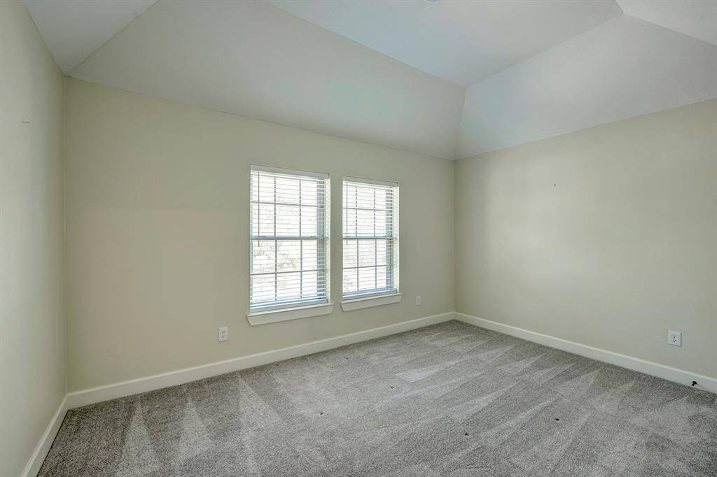 Secondary bedroom connected to the beautifully updated jack & jill bathroom.