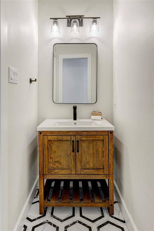 another view of the separate vanities for bedrooms 3 & 4.