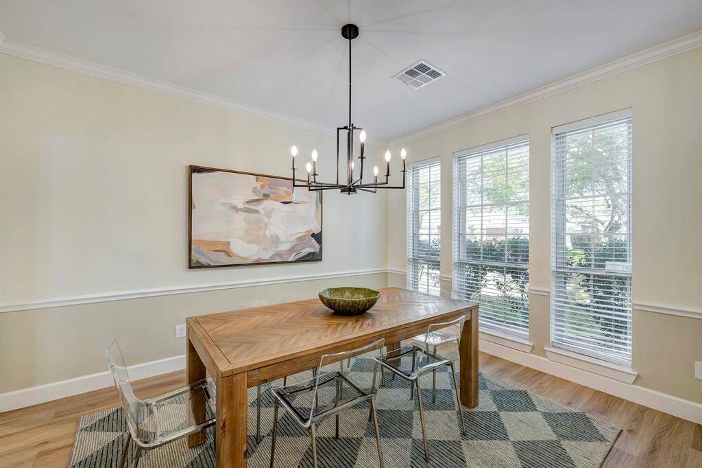 View of the beautiful dining room. The butlers pantry/laundry room is found just around the corner