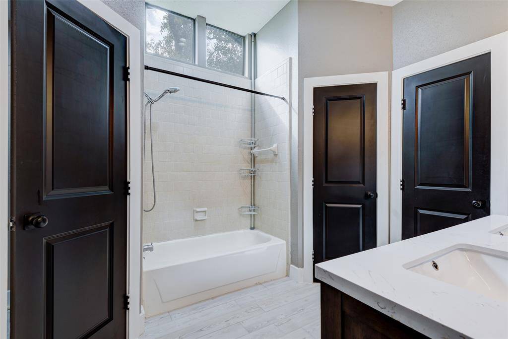 Primary bath features two closets...