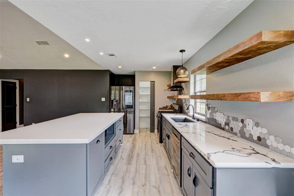 Noticing the pocket door on the pantry