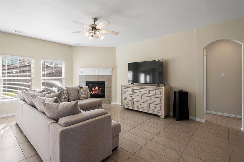 Spacious family room with gas log fireplace.