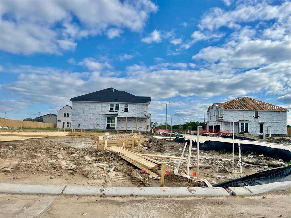 Three-story home with 4 bedrooms, 3.5 baths and 2 car garage.