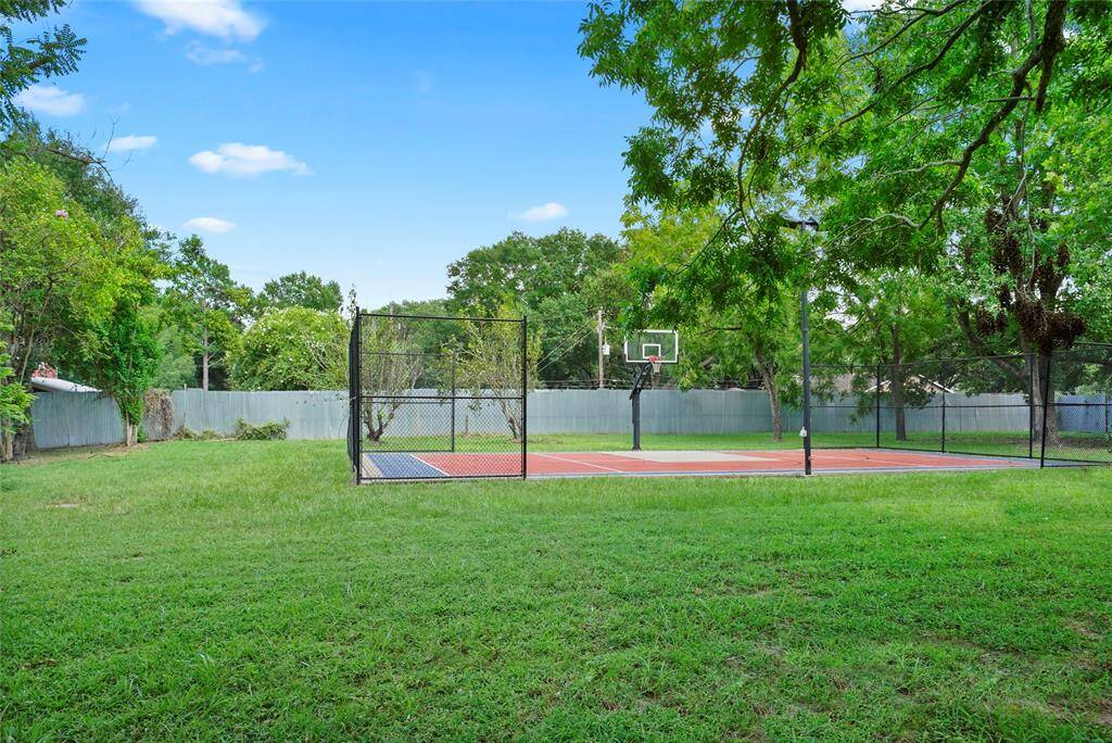 Private basketball court could easily be converted to a Pickleball court.