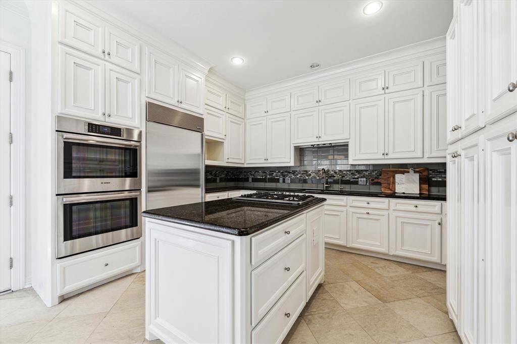 Timeless kitchen Ann Sacks tile work