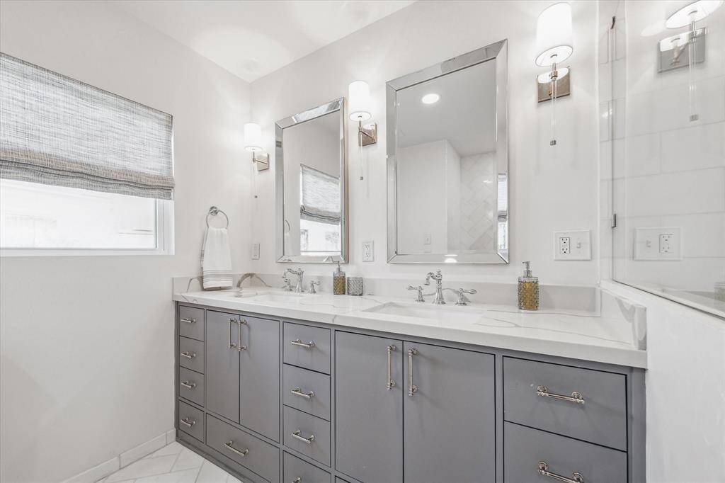 Fantastic secondary bath with dual sinks was recently updated.