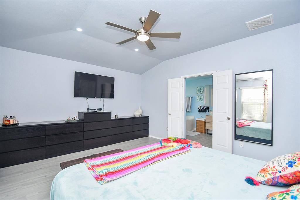 'Just look at the amazing amount of wall/floor space in your primary retreat; with ensuite bath beyond the double doors, right.