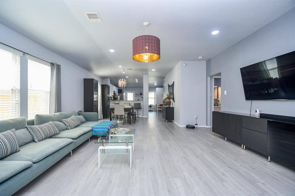 This is a great open view of the spectacular living/kitchen space in this special home.