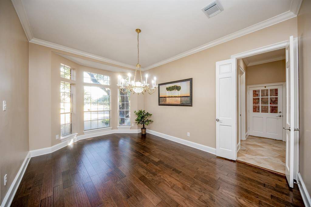 Just imagine the comfort of family holiday dinners here, or special entertaining moments in this story-book formal dining space, just off your gourmet kitchen, behind double doors, right.
