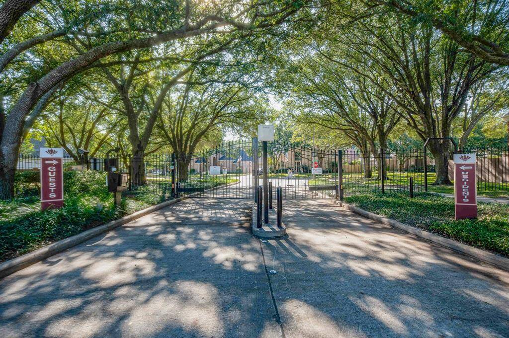 Natural tree branches add to the security of the gated community.
